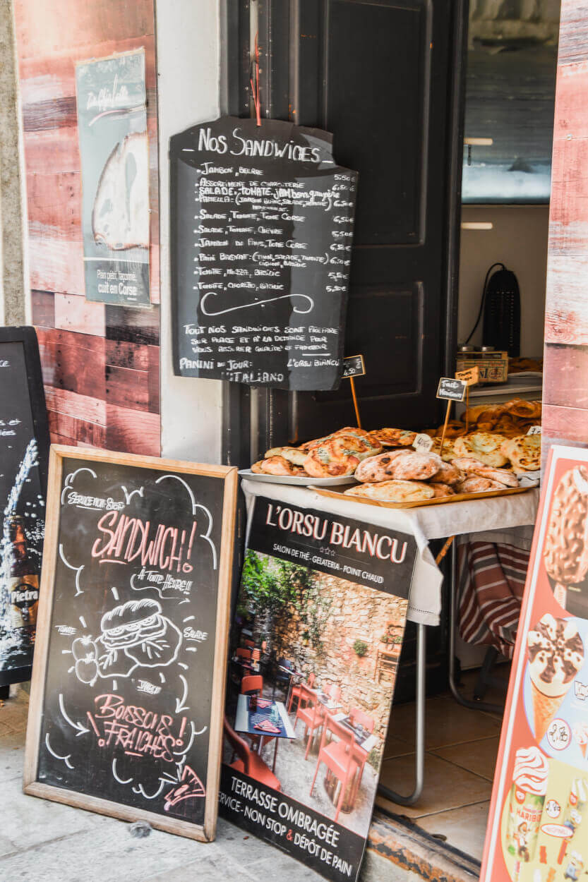 There are small, charming shops in Saint-Florent offering French delicacies. Here, you can buy fresh baked goods.