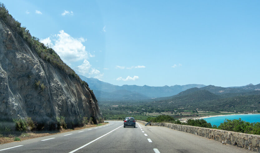 The coastal stretch towards L’Île-Rousse is insanely beautiful — here you catch glimpses of the most stunning azure-blue sea.
